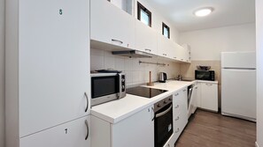 Kitchen equipped with appliances