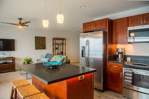 The kitchen has full size appliances, Ice maker, microwave, dishwasher and coffee maker.