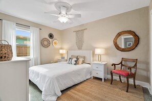 Relaxing master bedroom with natural light coming from the window