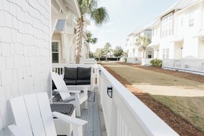 Outdoor seating on the balcony.