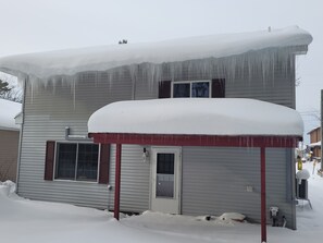 OVERALL:  The back of the home in winter.