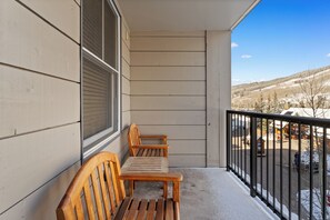 Private balcony with outdoor seating to soak in the mountain views!