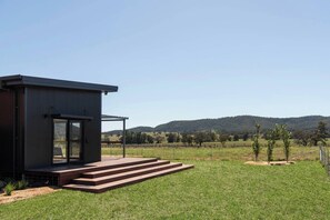 Nestled against a backdrop of rolling hills, soak up the serene countryside year round.