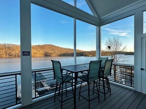 Dining area on screen porch main floor.