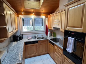 Kitchen, Kitchen Appliance, Countertop, Major Appliance, Cabinetry, Wood, Kitchen Sink, Interior Design, Flooring, Home Appliance