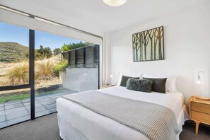 Beautiful lake and mountain views from the master bedroom.  Just imagine waking up and gazing at the Remarkables Mountains and Lake Wakatipu