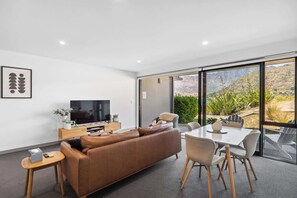 Large open plan living and dining rooms with gorgeous views