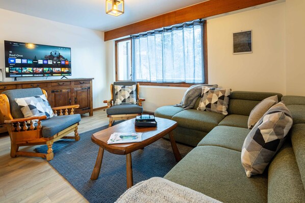 Open plan living area with two balconies