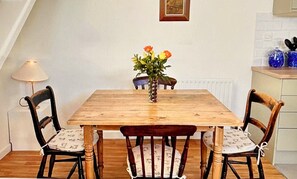 Dining area, antique farmhouse dining table and chairs.
