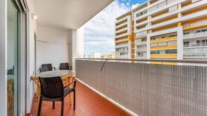 Enjoy your morning coffee or evening drinks on the private balcony with outdoor seating. It is a perfect spot to soak in the neighborhood vibe. #BalconyBliss #OutdoorRelaxation