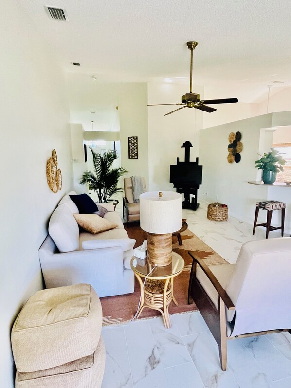 Living room with smart TV LOCATED ON ARTISTS EASEL