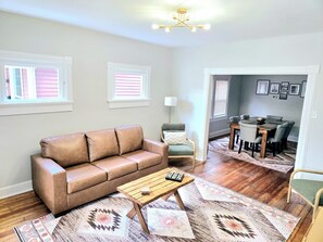 Large open living room with 50" Smart TV to stream all your favorites!