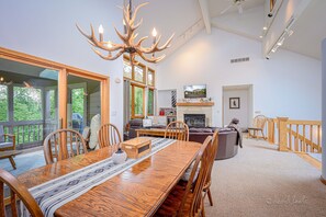 The dining room table comfortably seats 8 (as shown) and with leaves can seat 12
