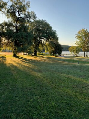 Main cottage lawn looking towards lake and view Southwest
