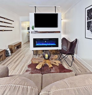 Electric fireplace, 50" smart TV