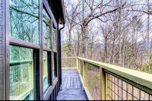enjoy the expansive deck and seasonal views.