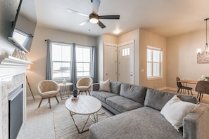 Living Room: plenty of seating space for a group, with East-facing windows
