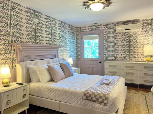 Suite 8: Queen bed, marble bath with glass enclosed shower, shares semi-private balcony with Suite 7 & 9, 50" Smart TV