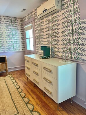 Suite 8: Queen bed, marble bath with glass enclosed shower, shares semi-private balcony with Suite 7 & 9, 50" Smart TV