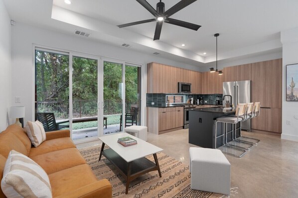 An open layout connects the kitchen and living area for seamless flow.An open layout connects the kitchen and living area for seamless flow.