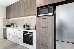 Beautiful modern kitchen with fantastic views of the mountains and lake.