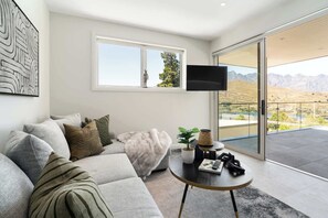 Fantastic views of the Remarkables Mountain Range and Lake Wakatipu from the huge outdoor deck, the living room, dining room, kitchen and master bedroom.