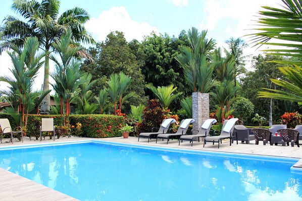 The Peacock Country Estate: a lush, tropical paradise with large pool.