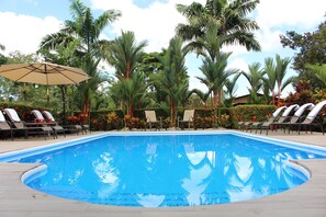 The pool and surrounding lounge areas. Just two steps from the Great Room.
