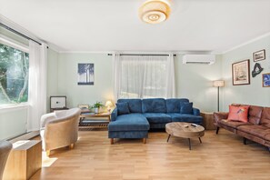 Sleeper sofa (center) and foldout futon (right); heat pump with A/C