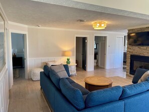Smart TV and cozy gas fireplace