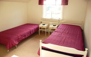 2 single beds + extra bed