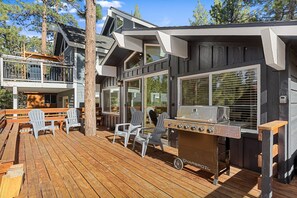 Enjoy the outdoor deck featuring seating options and gas propane grill.