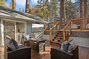 Stream one of your favorite shows or throw on the game while warming up outside on the deck.