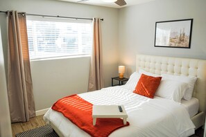 Desert Oasis room with Queen bed, smart TV and black out shades