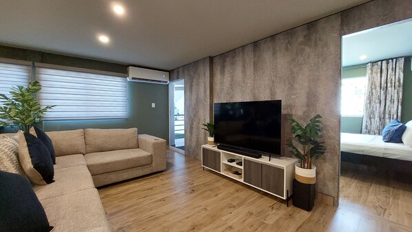 Cosy and comfy living room with 65" smart tv