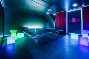 LED game room with ping pong, shuffle board, a TV, and more! - The Pink Stetson - Nashville, TN