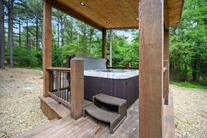 Enjoy the views from the covered hot tub.
