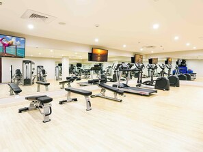 Gym facilities located across street included during stay.