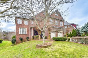 Property Exterior | Screened-In Porch | On-Site Fishing Pond