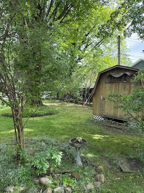 you will find bikes, a wagon, wood for the fire