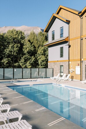 View of pool and large hot tub 