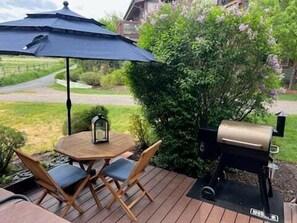 New bistro table, umbrella and Traeger grill