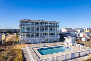 SEV405: The Sand Dollar | Rear Exterior - View of Community Pool