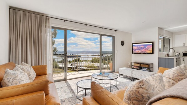 Living, kitchen, balcony