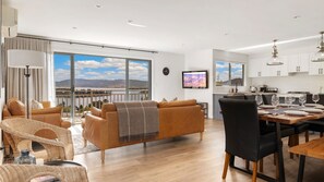 Living, dining, kitchen, balcony