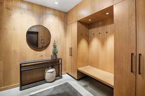 The "Mudroom" neatly stores coats, boots hats