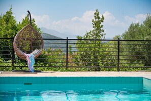 Relax by the beautiful swimming pool%2E