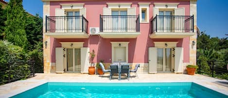 The property and pool under the morning sun