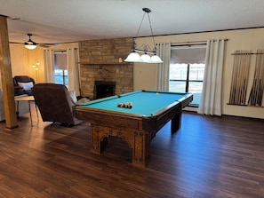 Pool table with everything you need. Slick, chalk, etc.