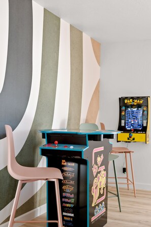 Get competitive in the game room, featuring arcade games perfect for all ages